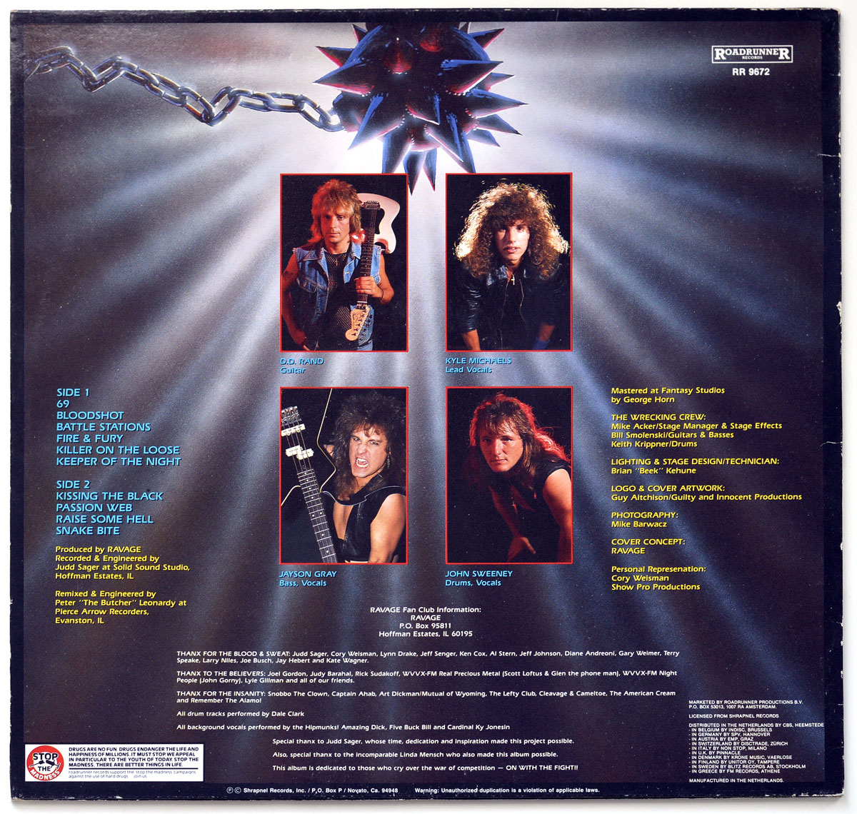 Back cover of RAVAGE - Wrecking Ball 1986 LP featuring band photos, tracklist, credits, and a chained spiked wrecking ball design at the top center against a spotlighted metal background